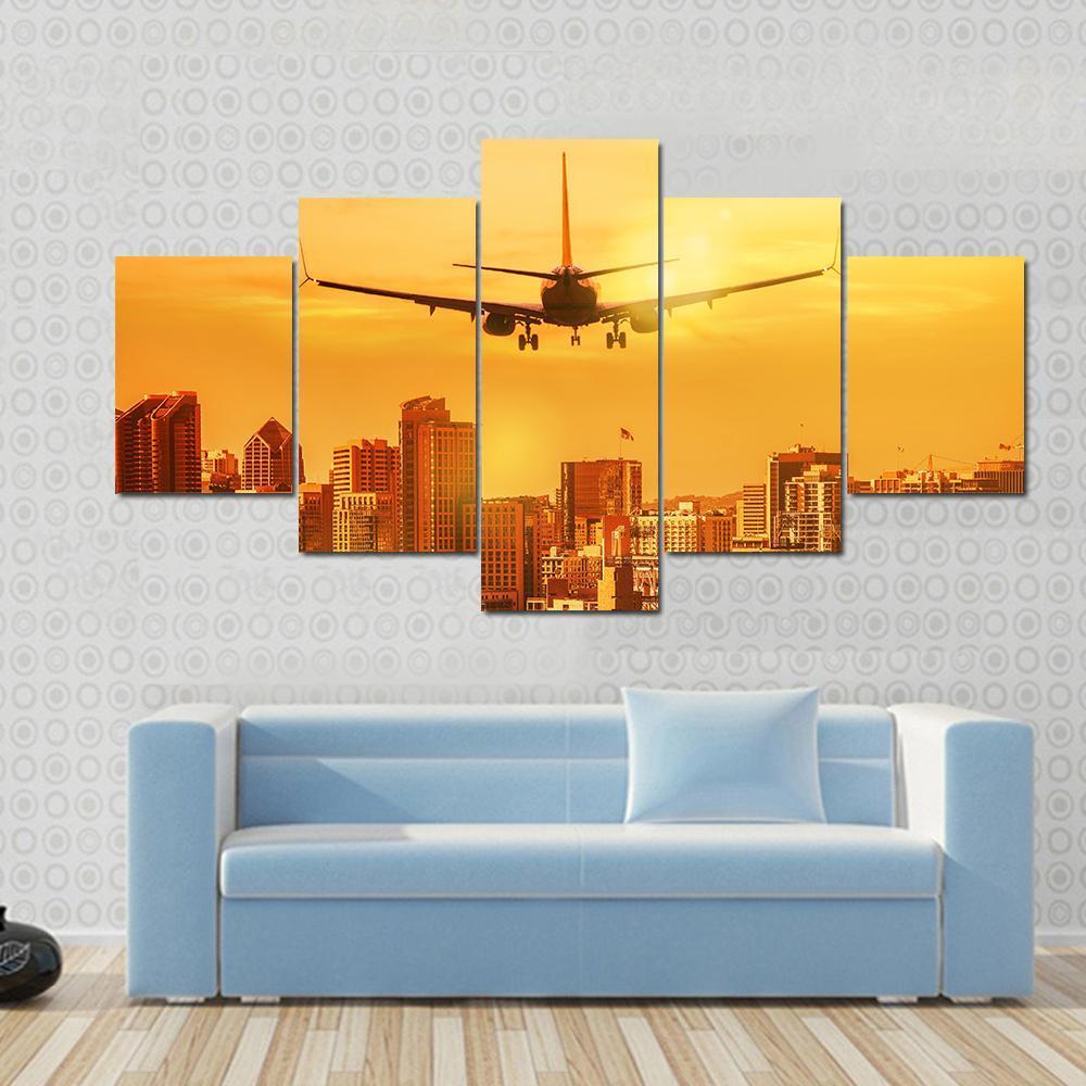Airplane Flying Towards Big City – Airplane Canvas Wall Art
