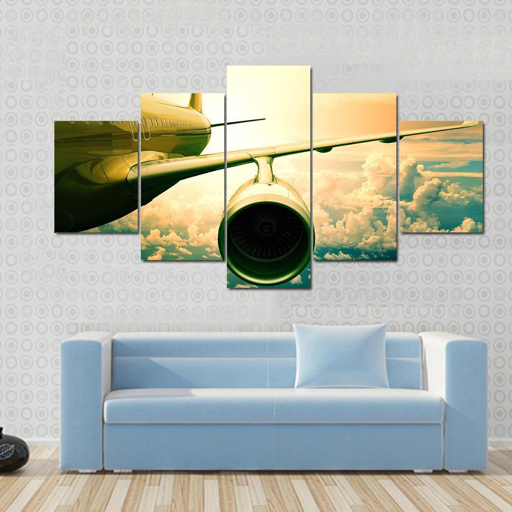 Airplane Wings Flying Above Clouds – Airplane Canvas Wall Art