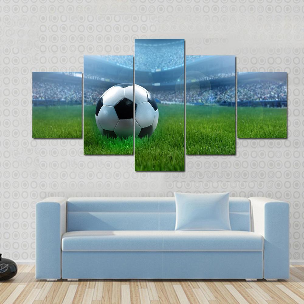 Close-Up Of A Football On A Full Stadium – Sport Canvas Wall Art