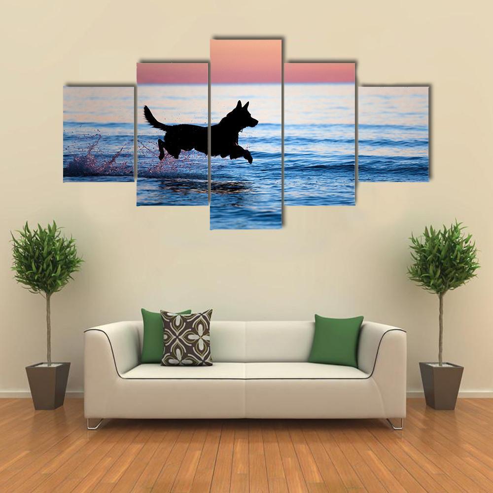 Dog Running On Water Against Horizon – Animal Canvas Wall Art