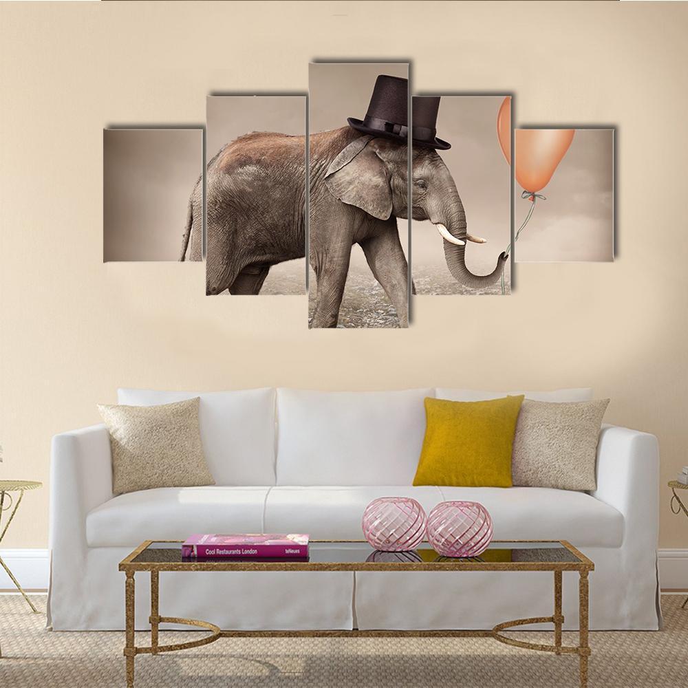 Elephant With A Orange Balloon – Animal Canvas Wall Art