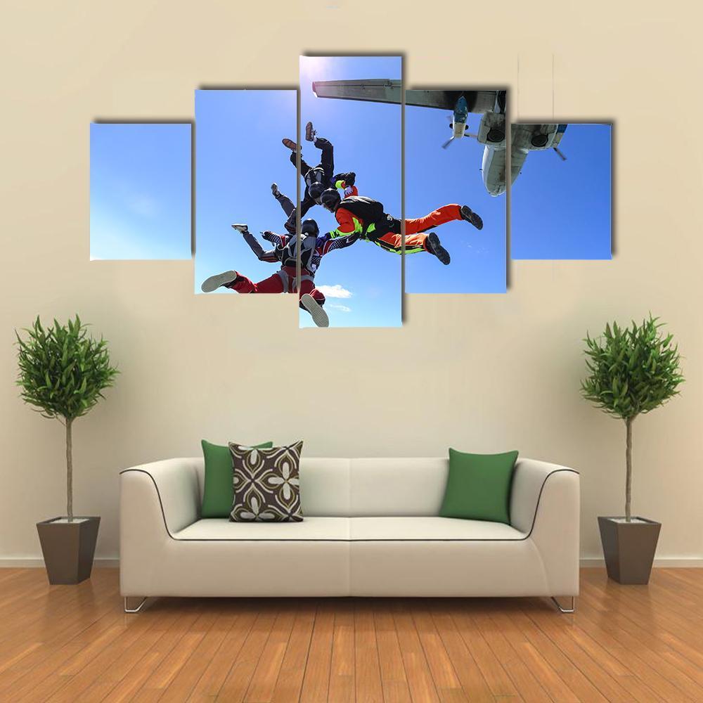 Four Parachutists Jumping Out Of An Airplane – Sport Canvas Wall Art