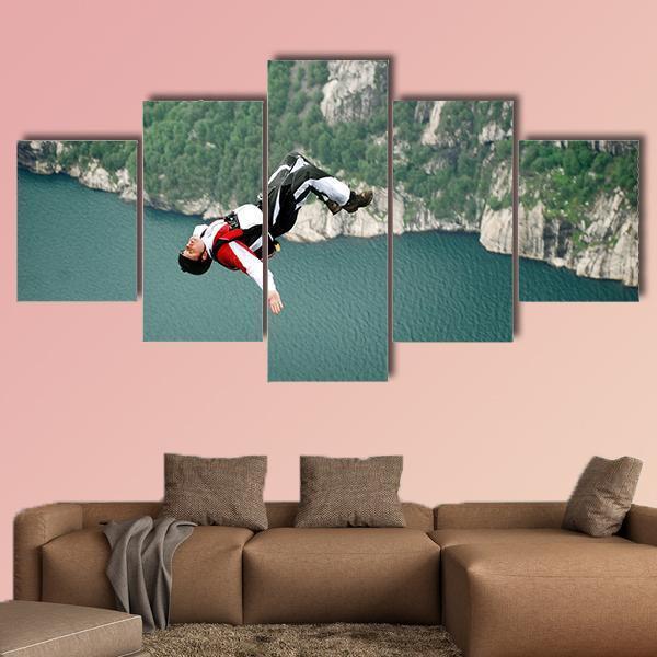 Jump Off A Cliff In Sea – Sport Canvas Wall Art